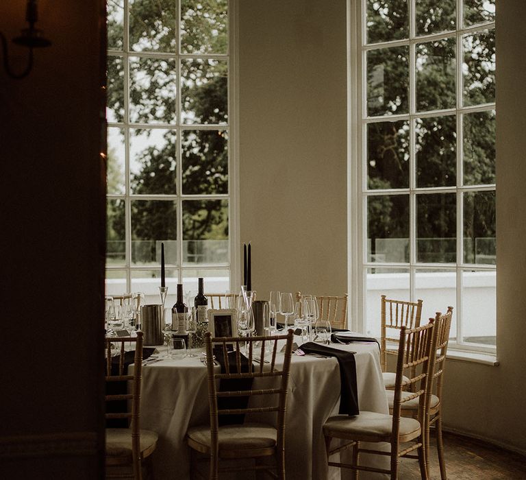 Gothic tablescape at Belair House with black napkins and black candles 