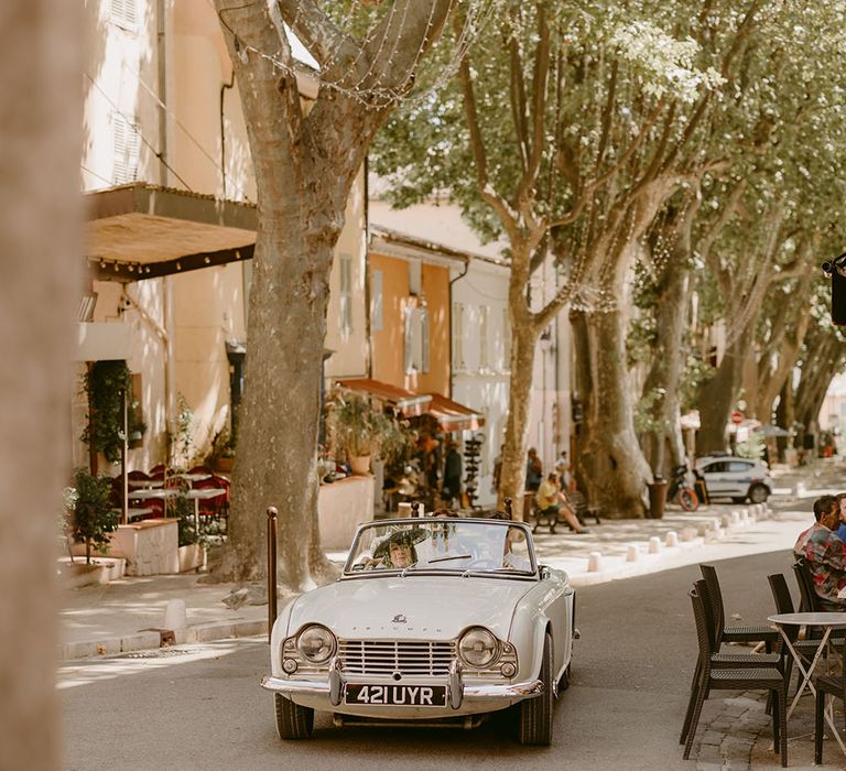 Vintage car in the South of France before church wedding ceremony 