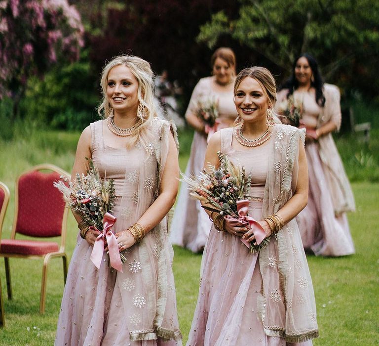 Pink and gold embellished sparkly bridesmaid dresses 