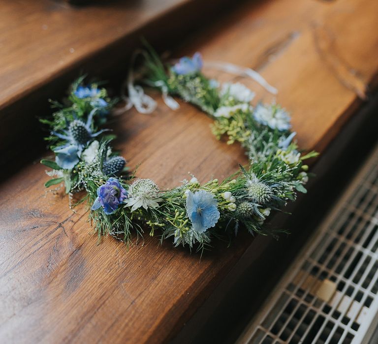 green foliage and blue flower crown 