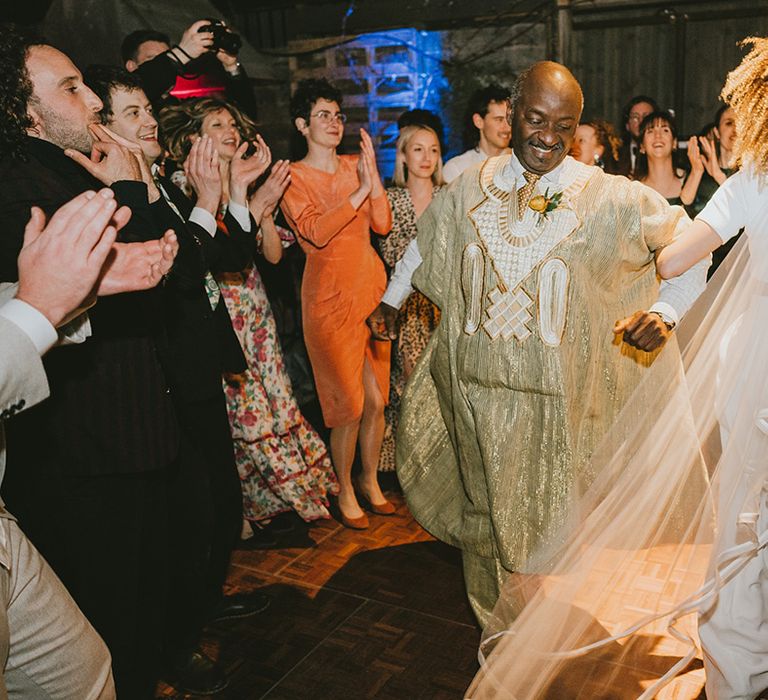 Father of the bride and the bride share a special dance together 