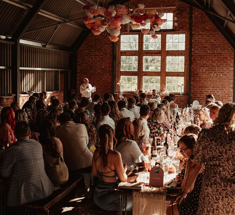 The Giraffe Shed in Wales wedding venue with pink decorations and flowers around the venue 