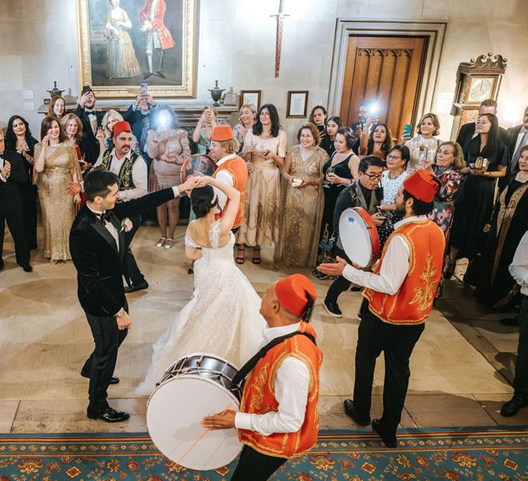 Zaffa band with wedding guests dancing at Chinese Arabic multicultural wedding 