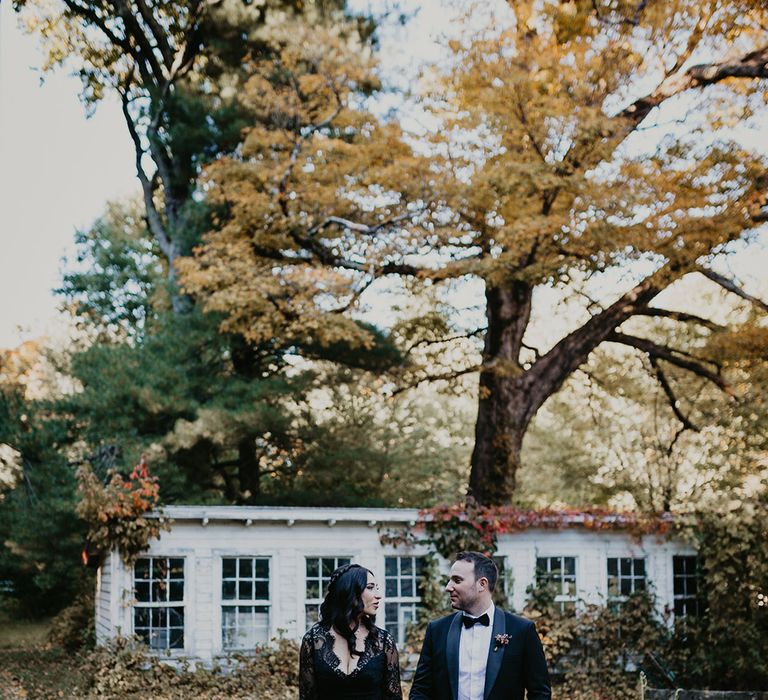 Foxfire Mountain House wedding with couple in all black wedding outfits 