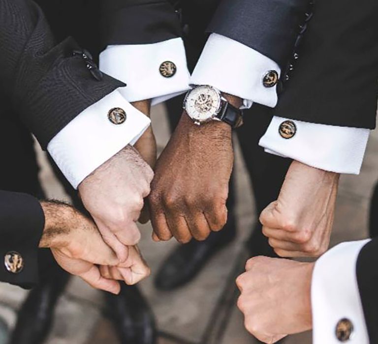 Groom and groomsmen wearing matching personalised cufflinks by Leon Jiber Photography