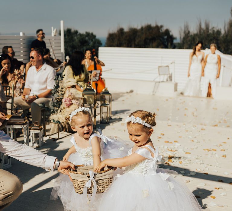 Flower girls in tulle white flower girl dresses for Santorini wedding 