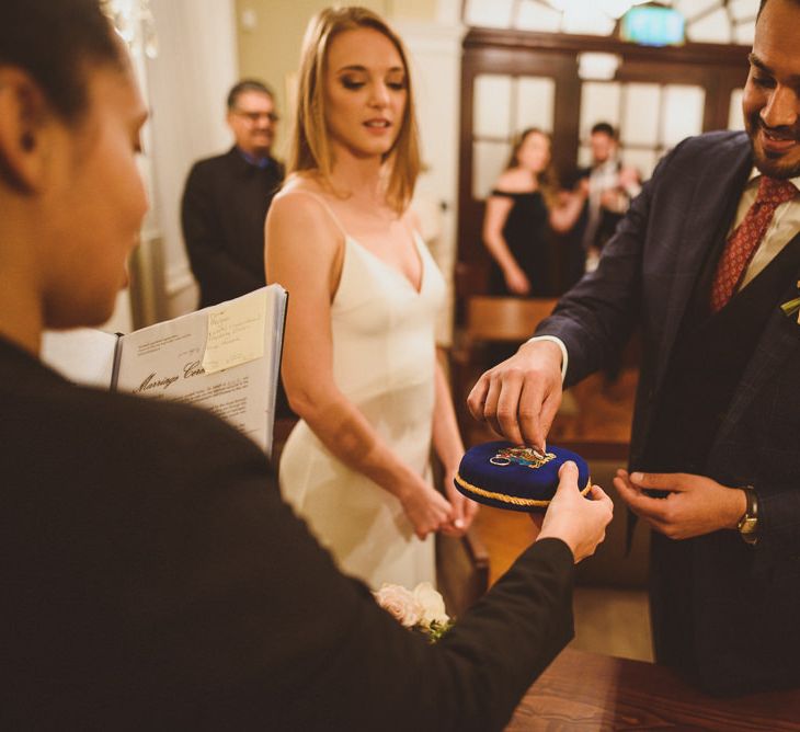 Exchanging of rings at town hall wedding in London