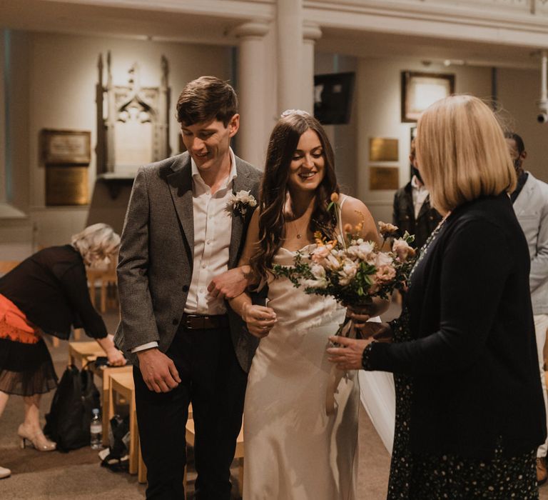 Bride and groom at the altar 