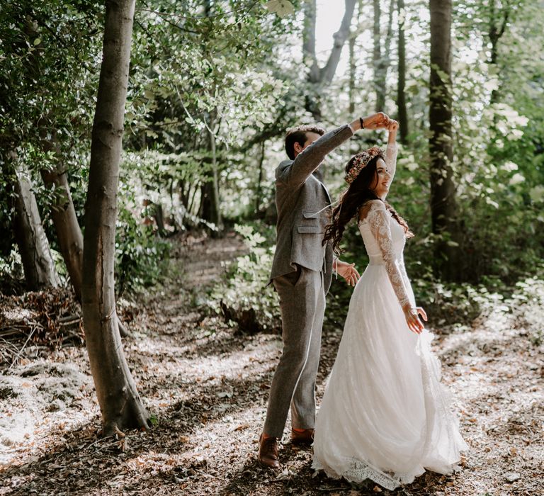 Bride and groom in forest couples shoot at Moor Hall wedding