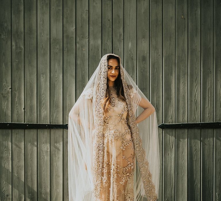 gold lace wedding dress and matching wedding veil 