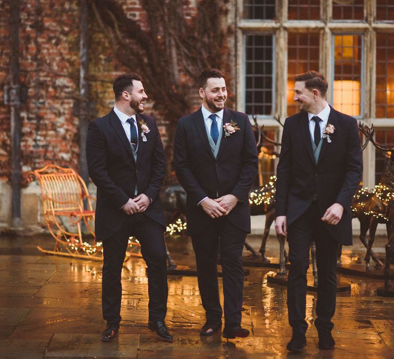 Groomsmen in traditional navy tails and grey waistcoat at Goldsborough Hall wedding 