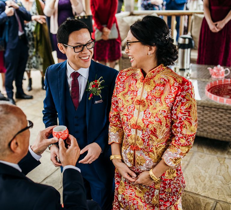 Bride & groom during traditional Chinese Tea Ceremony