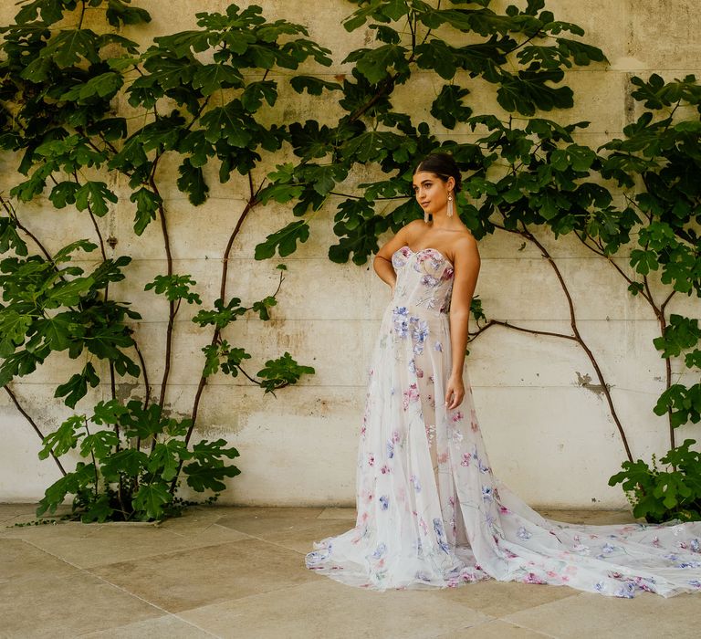 Bride in a hand painted wedding dress by Savin London via Lace & Co Bridal for a fiesta theme wedding 