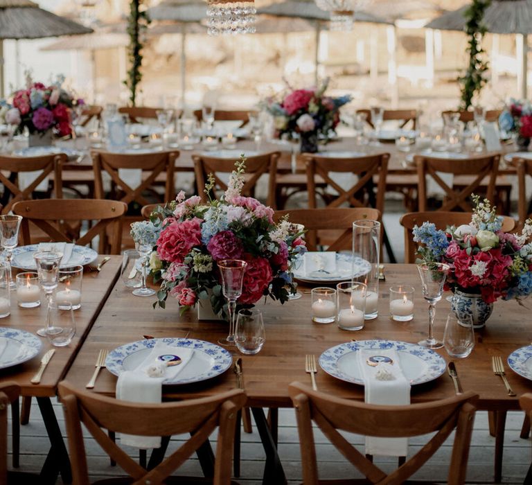 Beach wedding in Greece complete with banquet tables 