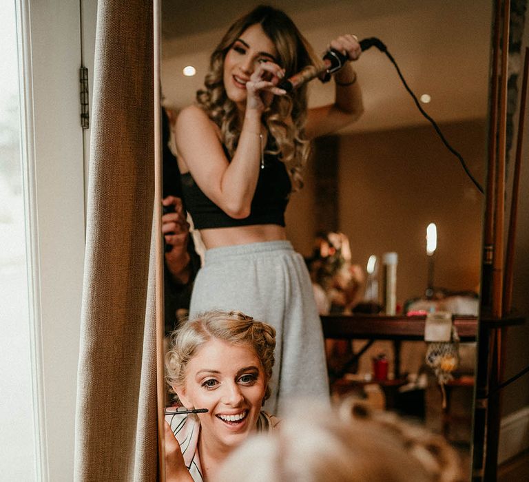 Bridesmaid preparations for wedding