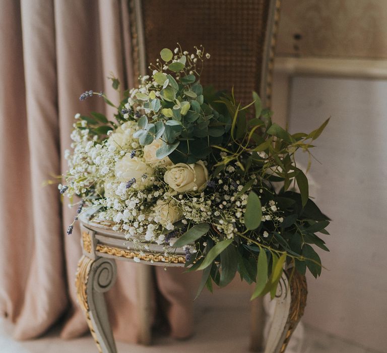 White rose and gypsophila with lavender and leaves for wedding bouquet 