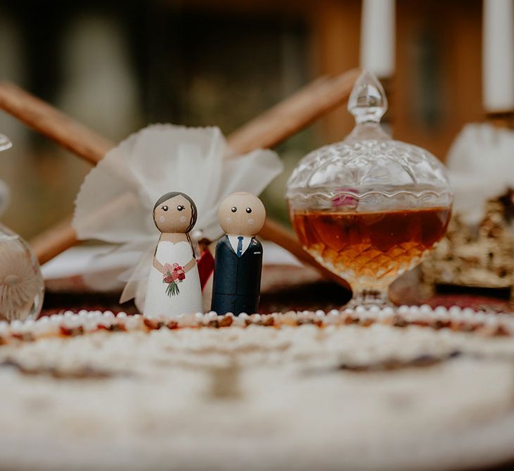 Small wooden bride & groom models for Sofreh Aghd table at traditional Iranian wedding 