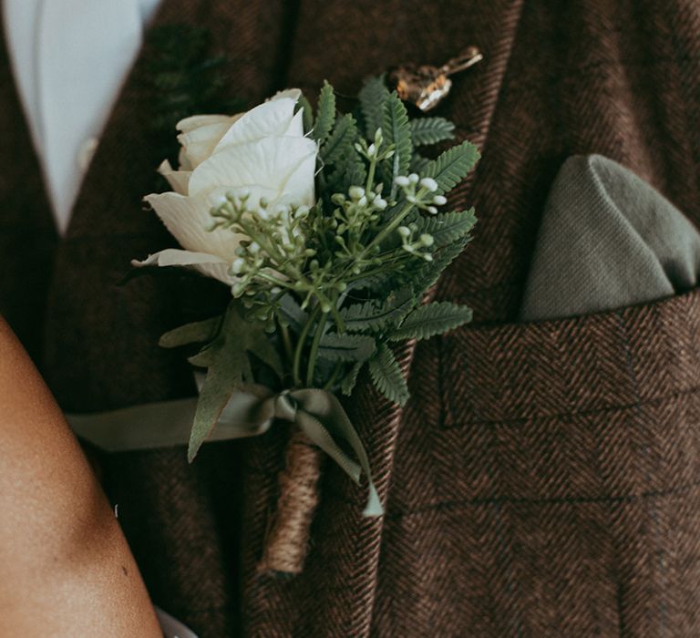 Faux wedding flower rose buttonhole for the groom 