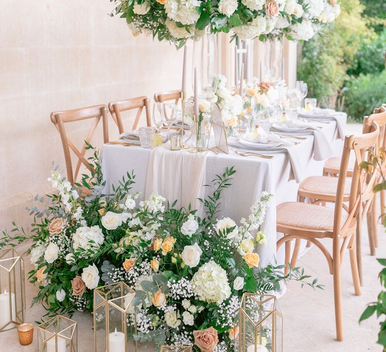 Al fresco reception for the Italian inspired wedding day with huge yellow flowers 