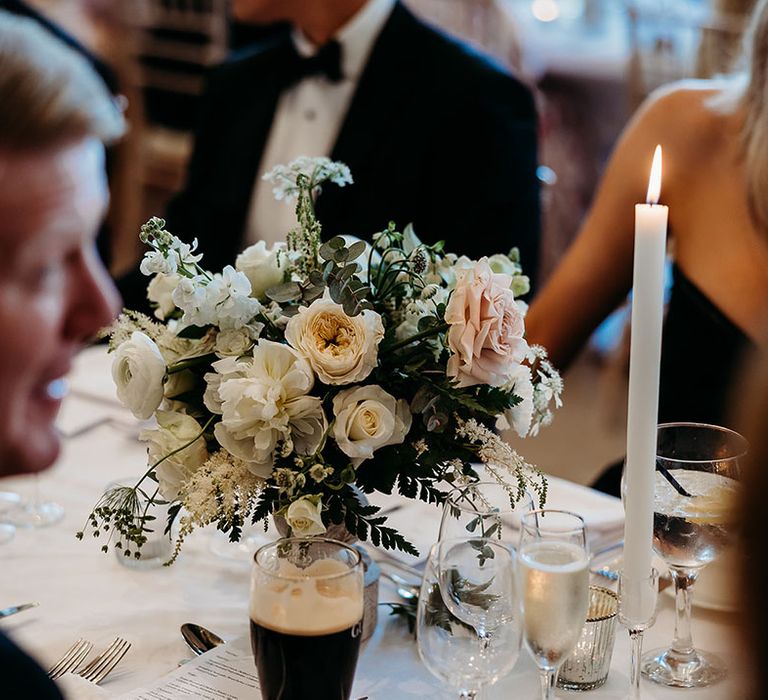 White wedding flower table arrangements for classic and traditional wedding 