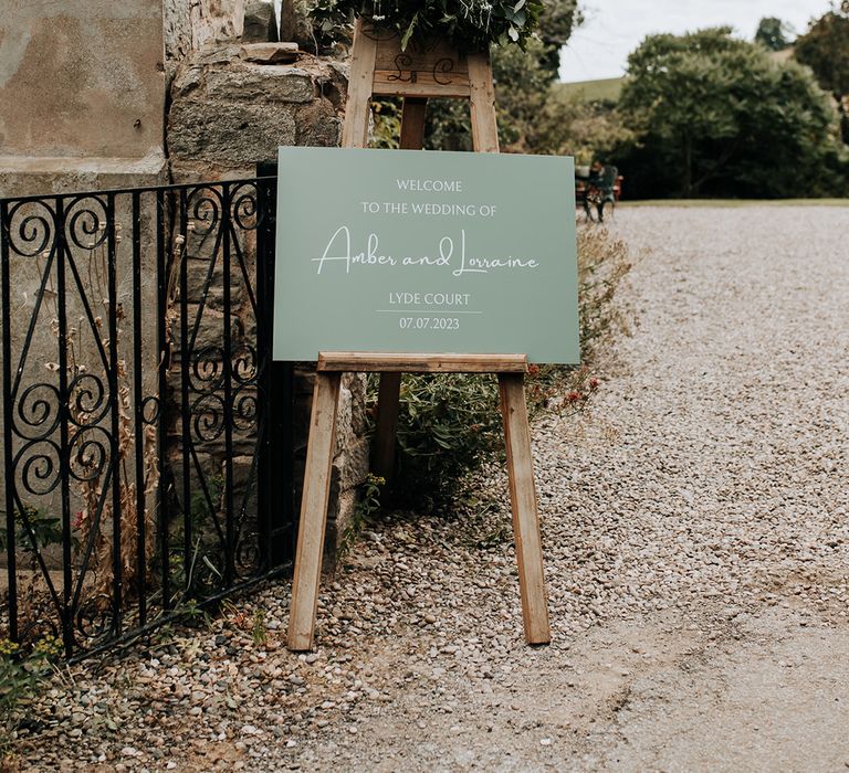 Sage green and white wedding welcome sign for 17th century barn wedding 