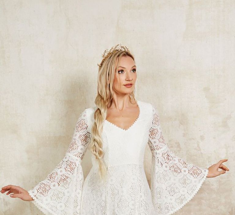 Sustainable 'Cassidy' wedding dress from Indiebride London in boho style with long bell sleeves and lace material