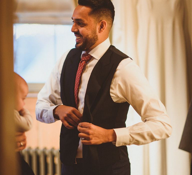 Groom getting ready for The Orange Chelsea Wedding 