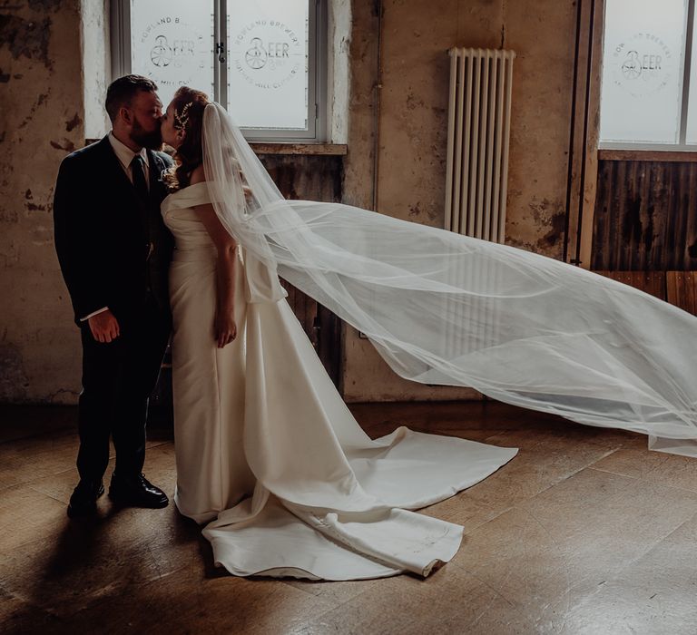 vintage wedding dress and cathedral length veil 