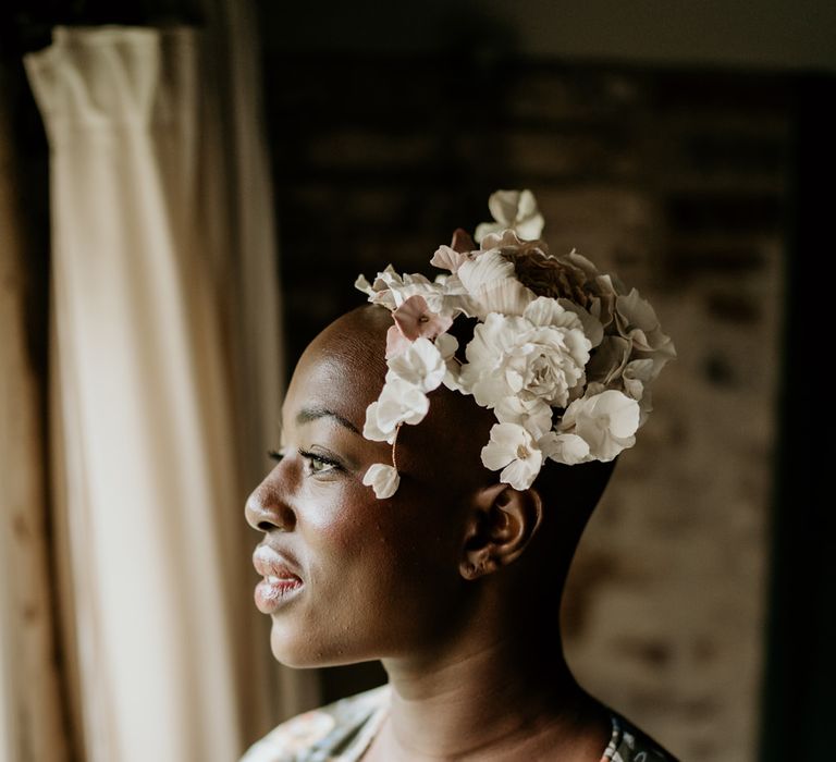 Bride with alopecia wearing a flower headpiece 