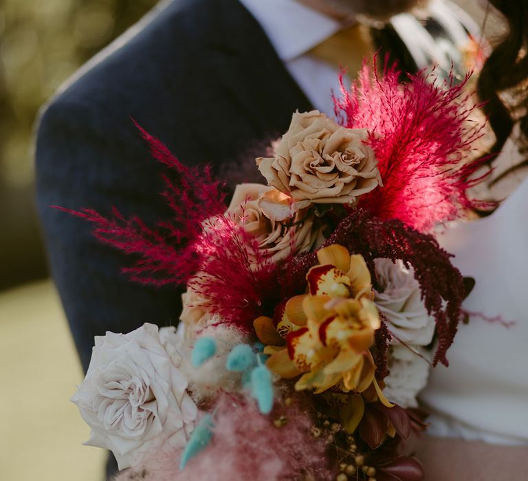 Colourful rose and pampas grass wedding bouquet