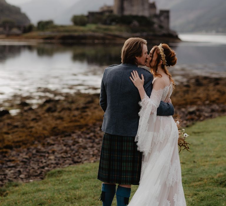 Bride & groom kiss during elopement 