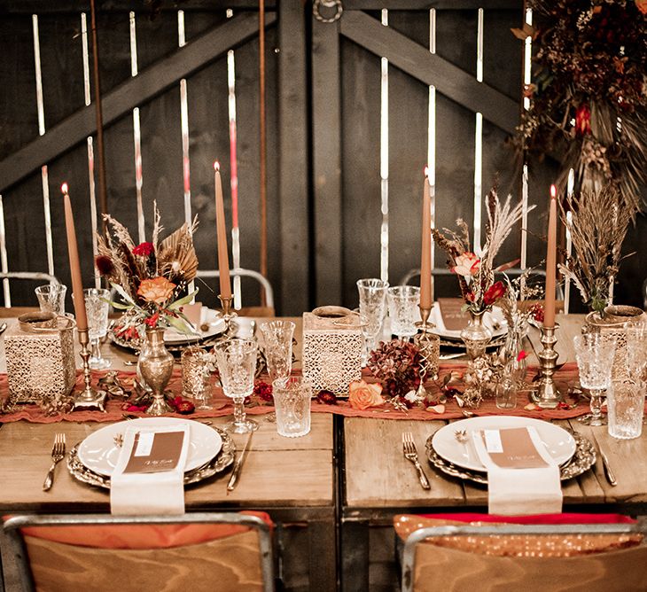 Moroccan table decor with fold charger plates, lanterns and candlesticks 