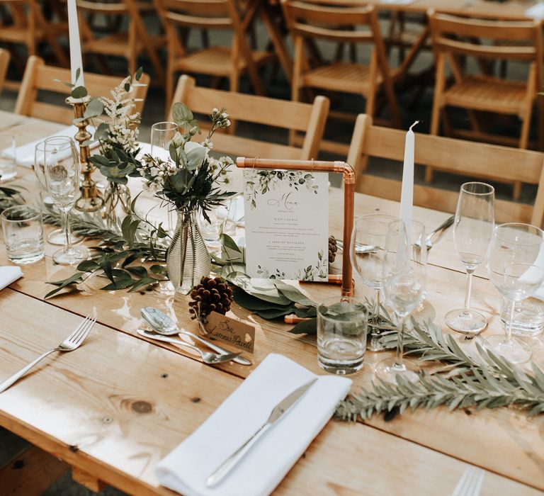 Copper signs and foliage wedding table decor