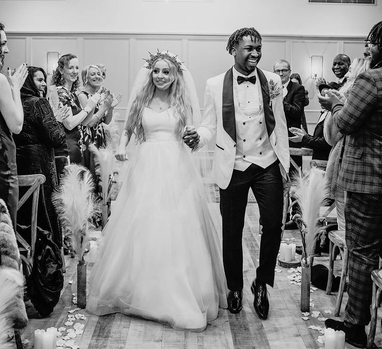 Bride and groom at winter wedding ceremony