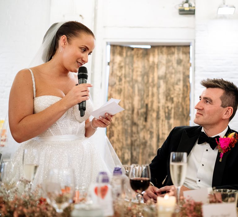 Bride gives wedding speech during reception at the 100 Barrington for colourful themed day