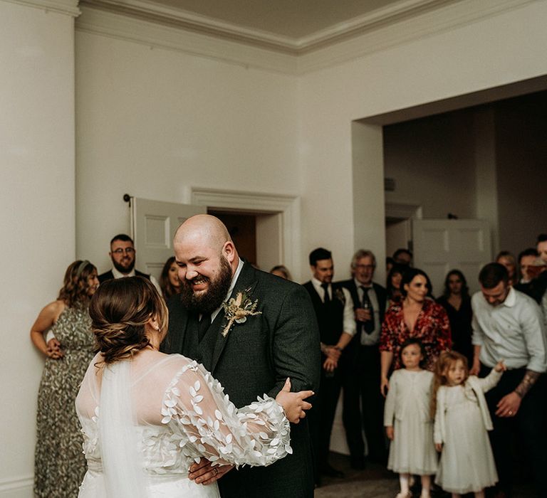 The bride and groom share their first dance together at Aswarby Rectory 