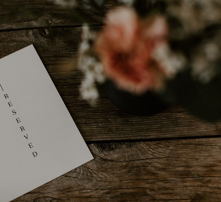 Black and white minimal simple wedding reserved seat sign for the benches at Aswarby Rectory wedding venue 