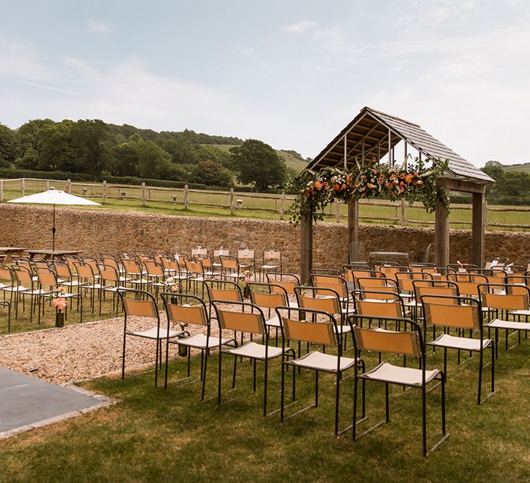 Hope Farm in Dorset wedding venue with outdoor ceremony set up 