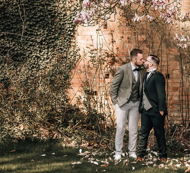 The grooms share a kiss at their gay wedding in Gloucester 