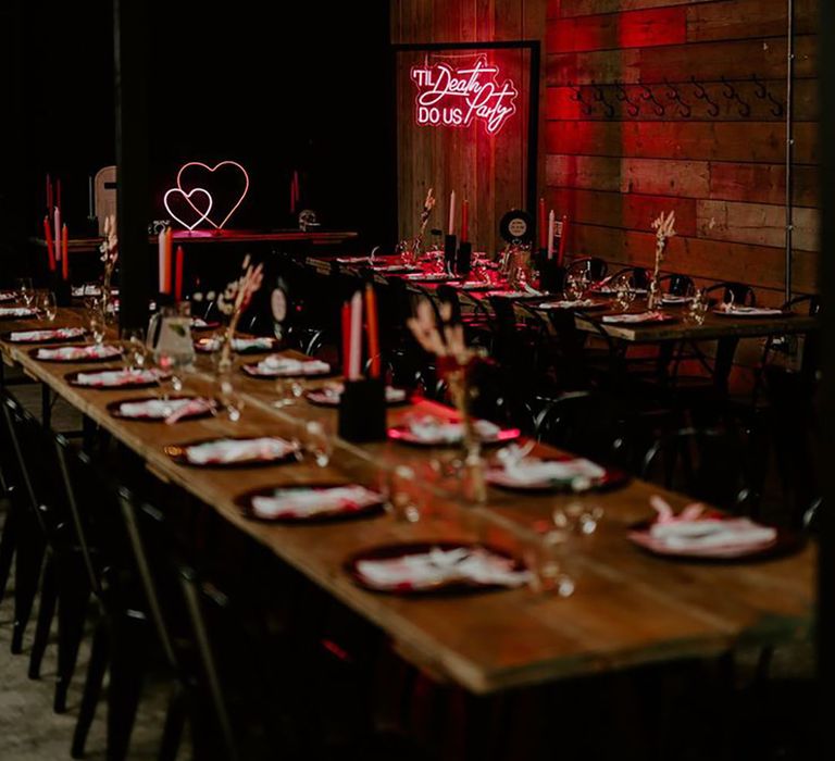 Pink neon sign and low lighting for rustic glam disco wedding 