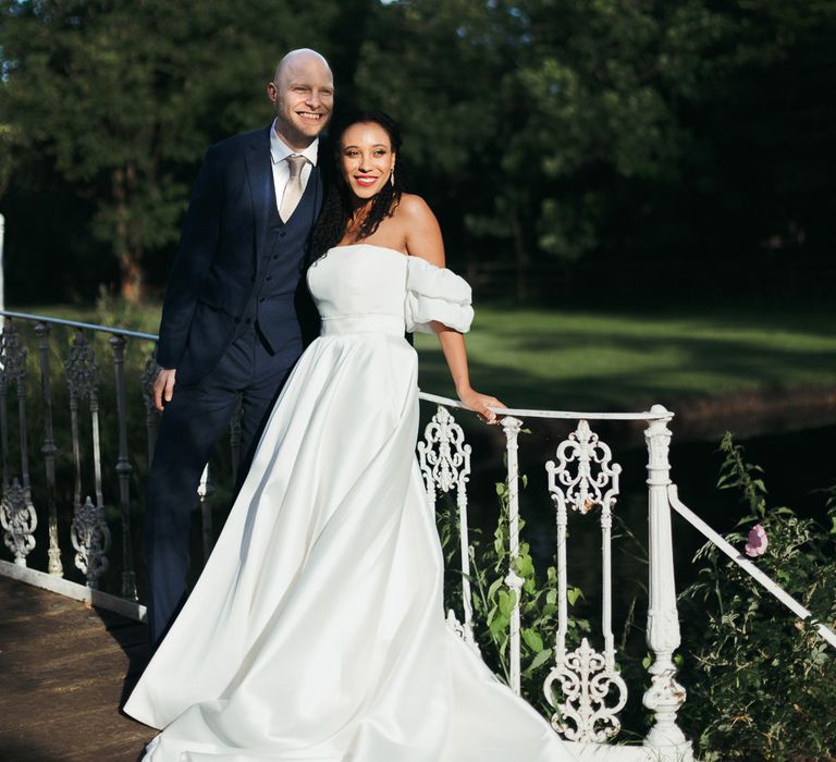 Bride and groom portrait in the gardens of Morden Hall