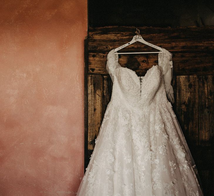 Tuscany bride's dress hanging up