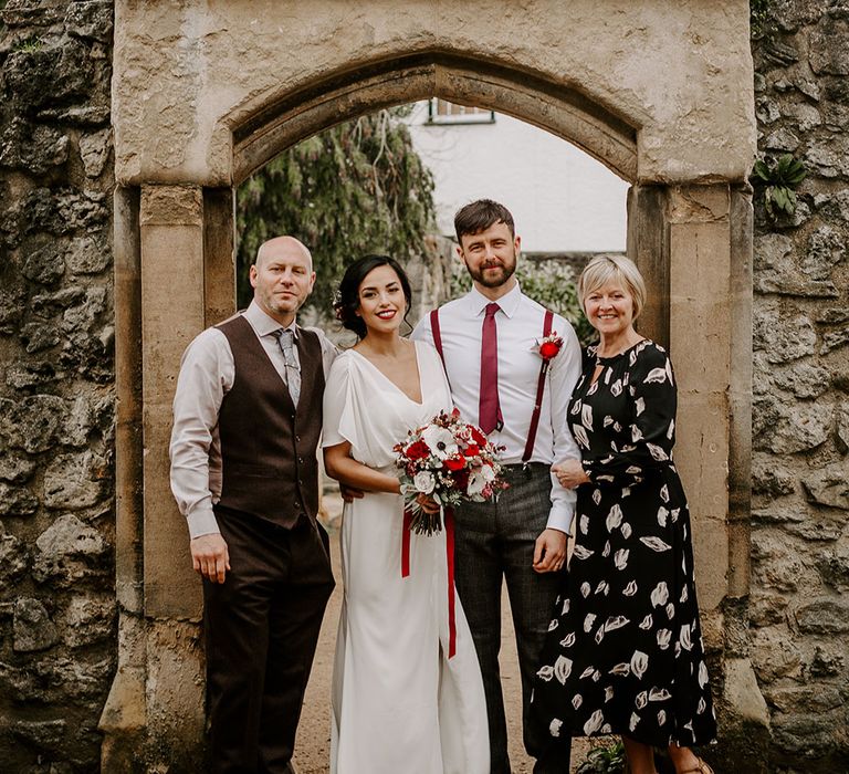 Bride and Groom with family at Wedding