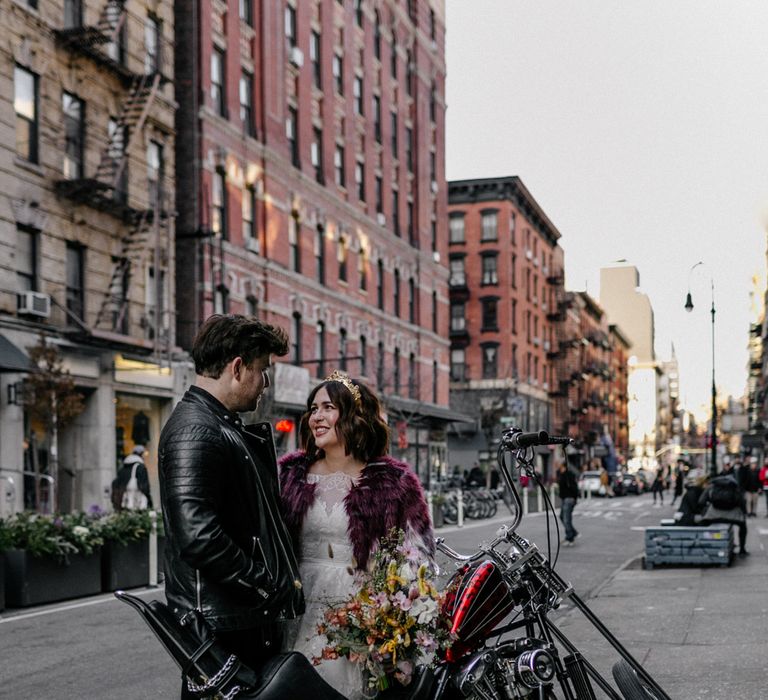 Bride & groom with motorbike in edgy New York elopement