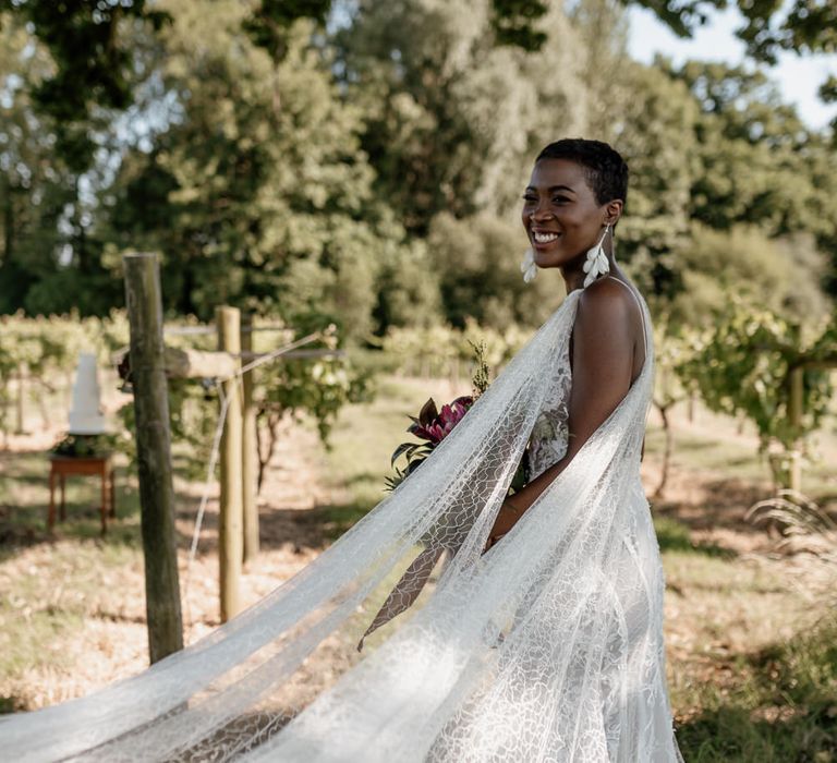 Black bride in backless wedding dress with lace watteau wedding train 