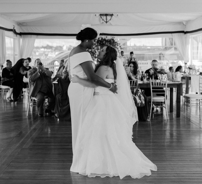 Black and white portrait of the bride and bride dancing at their intimate Covid secure wedding reception 