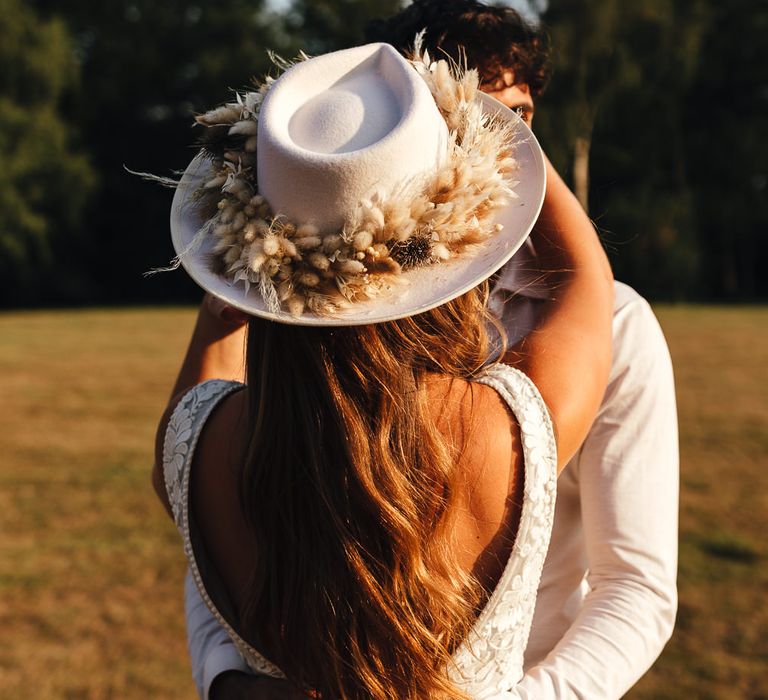 White fedora with floral decoration