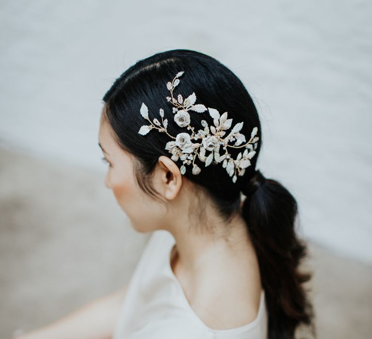 Sophisticated floral wedding hair accessories for a white and gold wedding theme