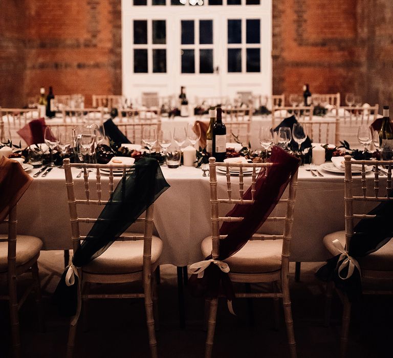 Long tables at Minley Manor with ribbons on chair for detail