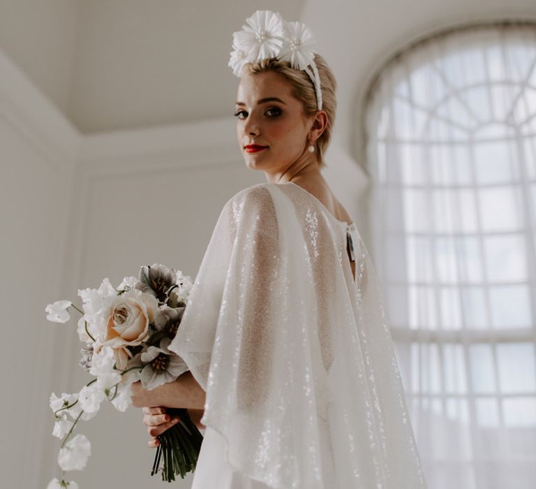 Short white sequinned bridal cape 